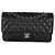 Timeless Borsa Chanel in caviar nero trapuntato medio classico con doppio flap