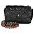 Timeless Piccola borsa a flap Chanel Cocovado in agnello trapuntato nero con catena a nastro