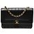 Chanel Borsa a tracolla Mademoiselle in agnello trapuntato verticale nero Medium