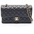 Borsa a tracolla Chanel Matelassé Double Flap Nero