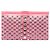 Clutch Miu Miu em napa rosa com detalhes de cristais e ilhoses