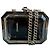 Clutch Premiere in metallo e acrilico Chanel con catena a tracolla