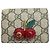 Mini billetera Gucci GG Supreme Cherry Beige