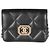 Timeless Mini borsa flap Chanel in pelle di vitello trapuntata nera e strass Nero