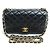 Borsa a tracolla Chanel Mini Classic in agnello Nero