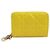 Dior Tarjetero Cannage amarillo con detalles en oro