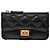 Tarjetero Chanel Black Quilted Aged Calfskin Reissue 2.55 Flap