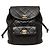 Chanel Matelassé Coco Mark Chain Rucksack Schwarz