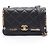Borsa Chanel Mini Flap in agnello nero