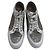 Jimmy Choo Baskets en cuir blanc et pailleté Métallisé