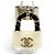 Charm per borsa Chanel B23C Matelassé Turnlock Nero Bianco