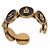 Bracciale rigido Chanel Camélia, N°5 e testa di leone Nero D'oro