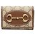 Cartera tríptico Gucci GG Supreme Horsebit Castaño