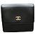 Cartera tríptico Chanel en cuero negro