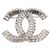 Spilla Chanel in metallo argentato e cristalli Argento