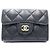 Timeless Cartera tríptico Chanel en piel de becerro granulado negro