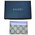 Tarjetero Gucci GG Supreme con piel lila