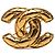 Spilla Chanel Gold CC trapuntata placcata oro D'oro