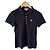 Polo Burberry de algodón negro con emblema dorado