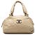 Borsa bowling Coco Rider in pelle di vitello invecchiata trapuntata CC beige Chanel