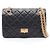 Bolso de hombro Chanel 2.55 en piel de becerro negro
