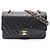Timeless Borsa a spalla a doppio flap in chevron V-stitch di Chanel Nero