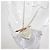 Bracciale con charm in argento sterling e oro giallo 18K di Tiffany & Co. - vista 3