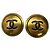Orecchini a clip tondi Chanel Coco Mark Nero D'oro