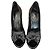 Yves Saint Laurent Décolleté Peep-Toe in Vernice Nera con Fiocco