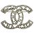 Spilla in argento Chanel con perla finta e strass