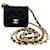 Mini borsa a tracolla in raso nero Chanel