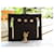 Yves Saint Laurent Spilla YSL Cassandre Oro Nero Gold hardware  - vista 2
