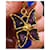 Yves Saint Laurent Pendentif papillon en métal doré et émail violet  - vue 4