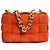 Bottega Veneta Bolsa Cassette acolchoada em camurça laranja