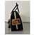 Bolsa Chopard em pele dourada e preta com detalhes de leopardo Preto Dourado - vista 4