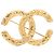 Spilla Chanel Gold CC placcata oro con rilievo barocco D'oro