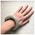 Autre Marque Bracciale a cerchio in resina taupe con glitter Iris Apfel x Le Bon Marché Rive Gauche Grigio - vista 8