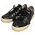 Sneakers con lacci e nappe in pelle Tod's Nero