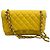 Timeless Chanel Classic Flap Bag medium aus gestepptem Lammleder gelb