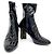 Louis Vuitton Botines de charol Negro