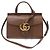 Gucci Kleiner GG Marmont Top Handle aus braunem Leder