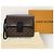 Louis Vuitton Clutch Monogram Lock - vista 7