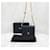 Chanel Mini bolso con solapa y cadena en piel de cordero negro y oro - vista 9
