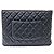 Chanel Clutch Caviar New Medium Negro - vista 3