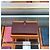Hermès Lange Brieftasche Beige mit Goldprägung - Geschenk Rot - Ansicht 4