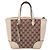 Gucci Piccola borsa a tracolla con zip in tessuto GG bianco