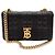 Burberry Mini Borsa con Ruote Trapuntata Nera Nero