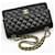 Chanel Borsa a Spalla Classic Medium in Agnello Nero e Oro - vista 3