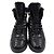 Chanel Baskets montantes en agneau verni