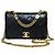 Chanel Mini borsa flap trapuntata in agnello nero con finiture oro